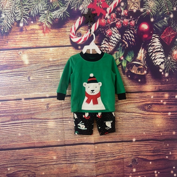 Brand new boys Carter’s 2 piece holiday themed pajamas. Size is 12 months. - Picture 1 of 11